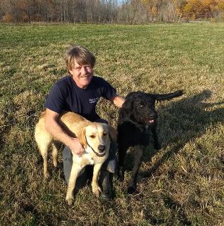 David Belding posing with the dogs